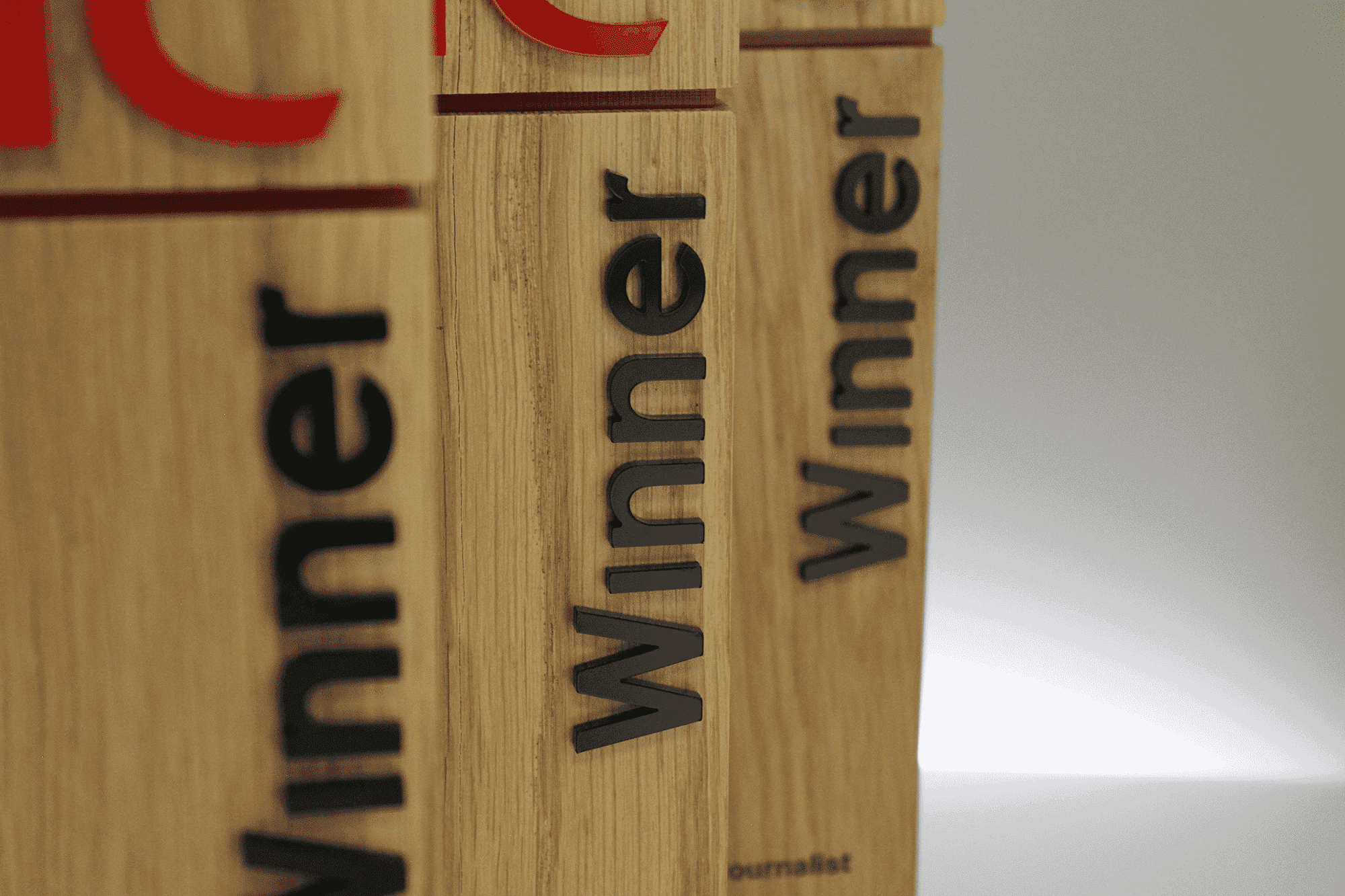 Wooden trophies for AIC Media