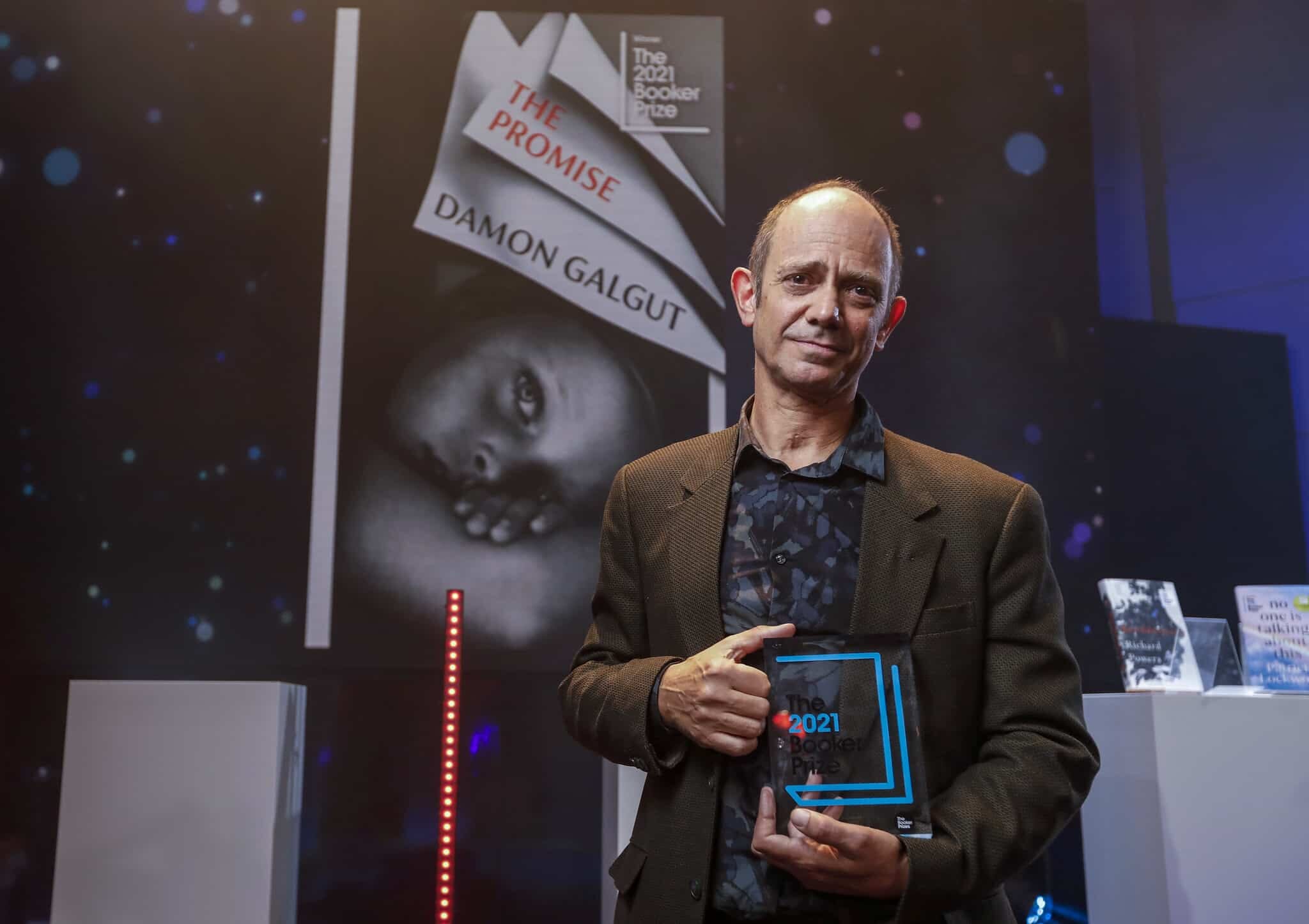 Booker-Prize-2014-Damon-Galgut-with-trophy-c-David-Parry-PA-Wire