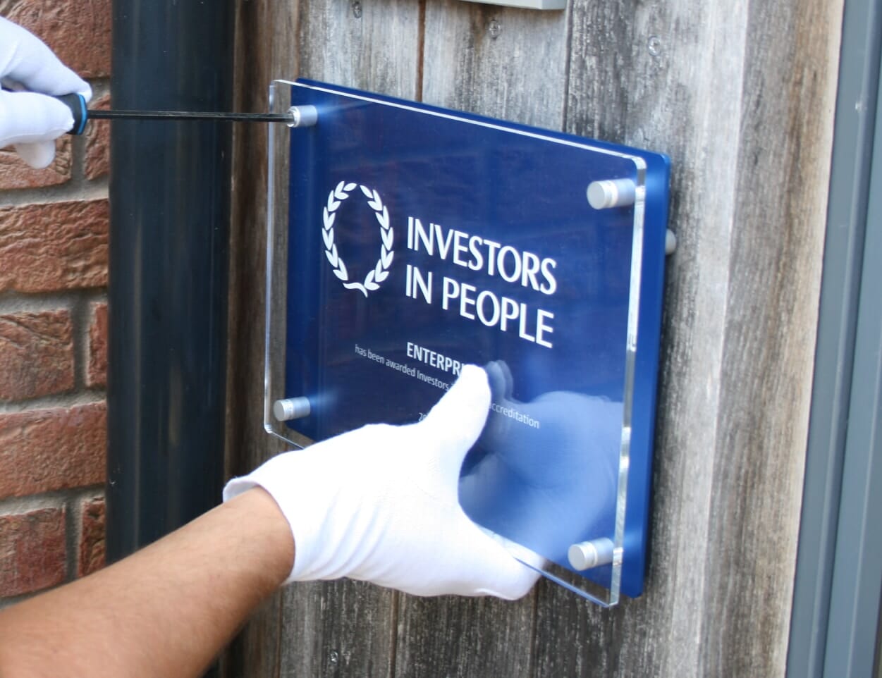 Custom-Plaque-Fixed-to-Wall-Cropped-3-1