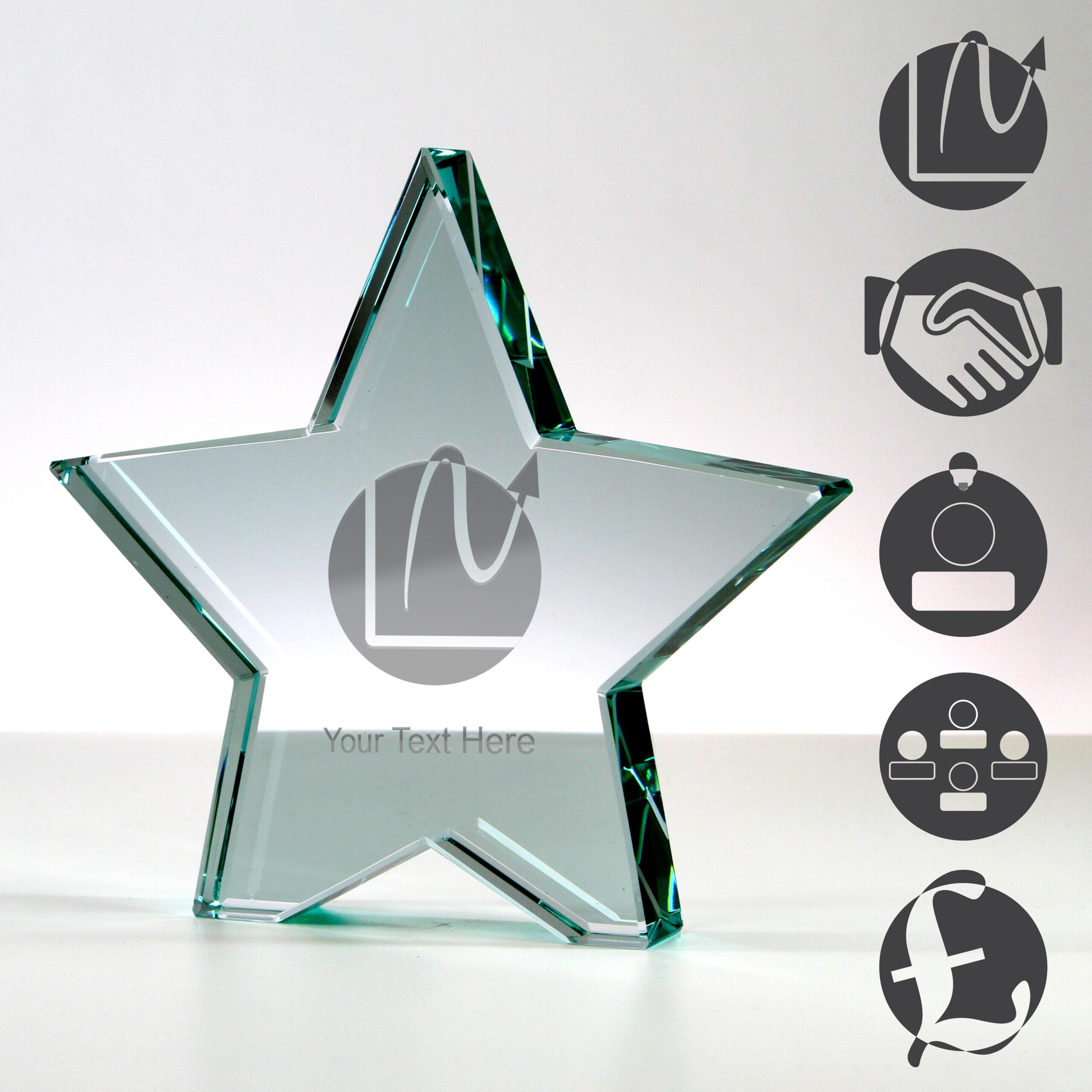 glass star trophy with five examples of corporate themed engraving