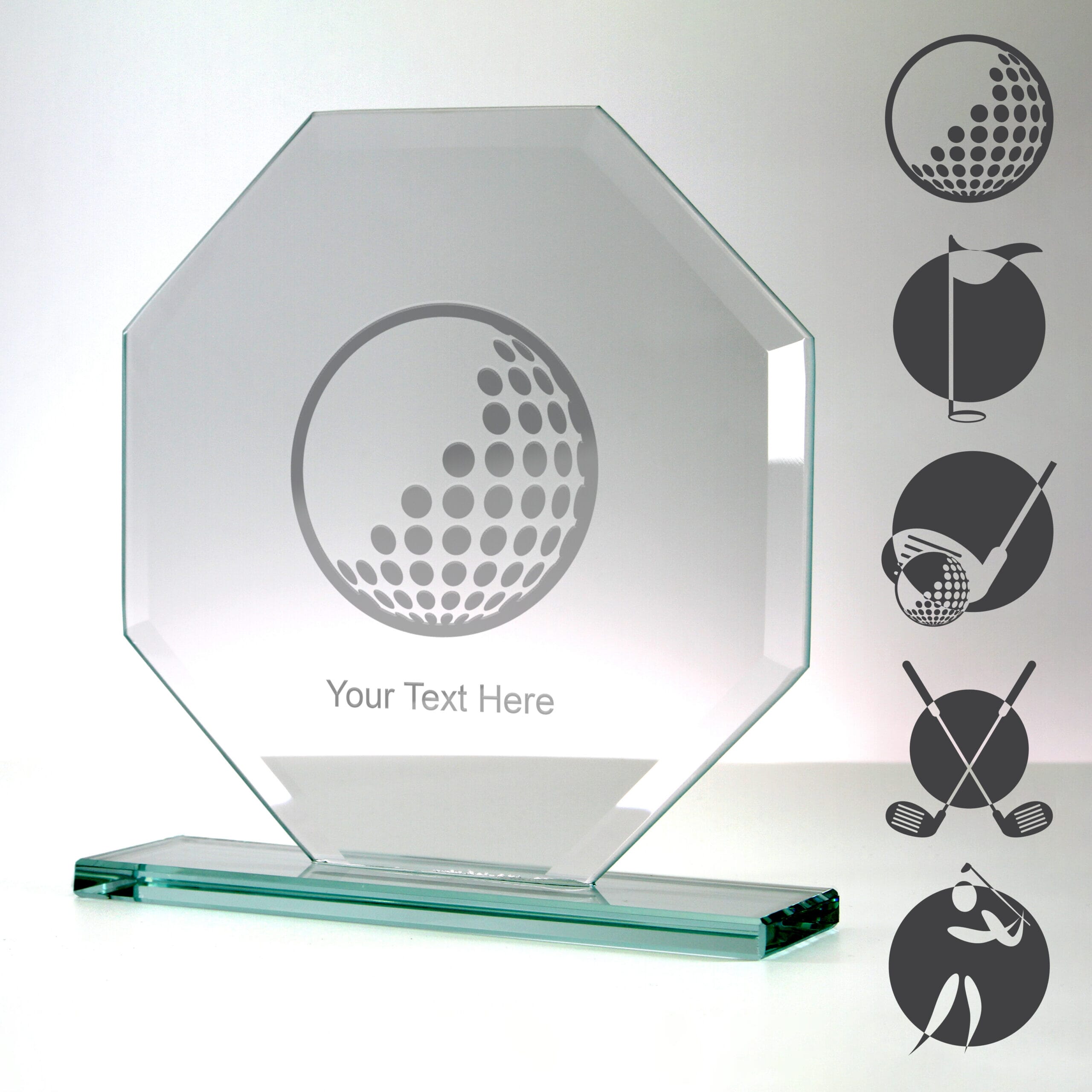 octagonal golf trophy with examples of golf-themed artwork engraved on the surface
