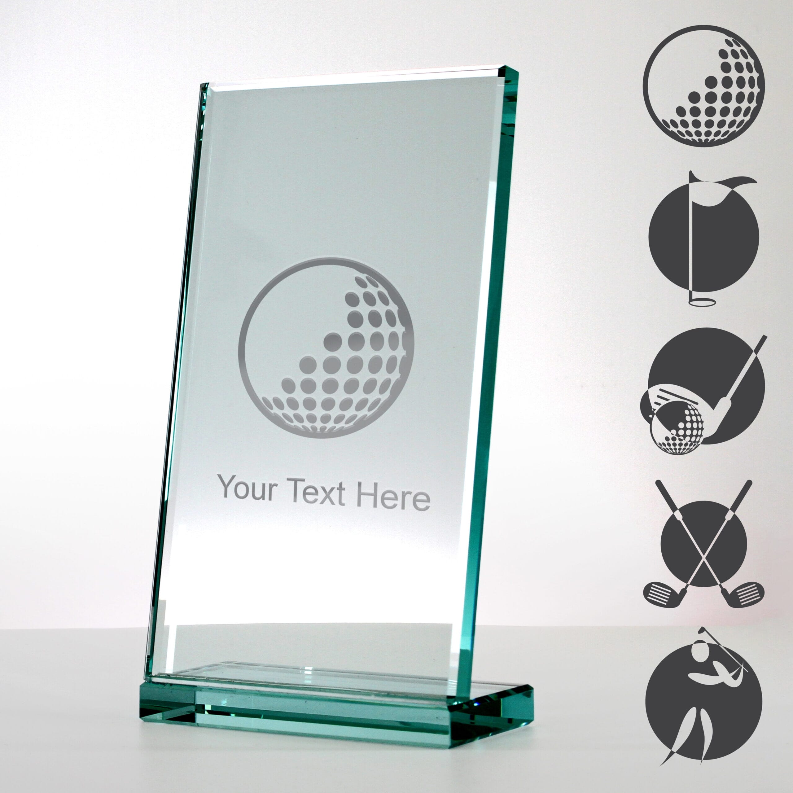 modern angled glass golf trophy with examples of golf-themed artwork engraved on the surface