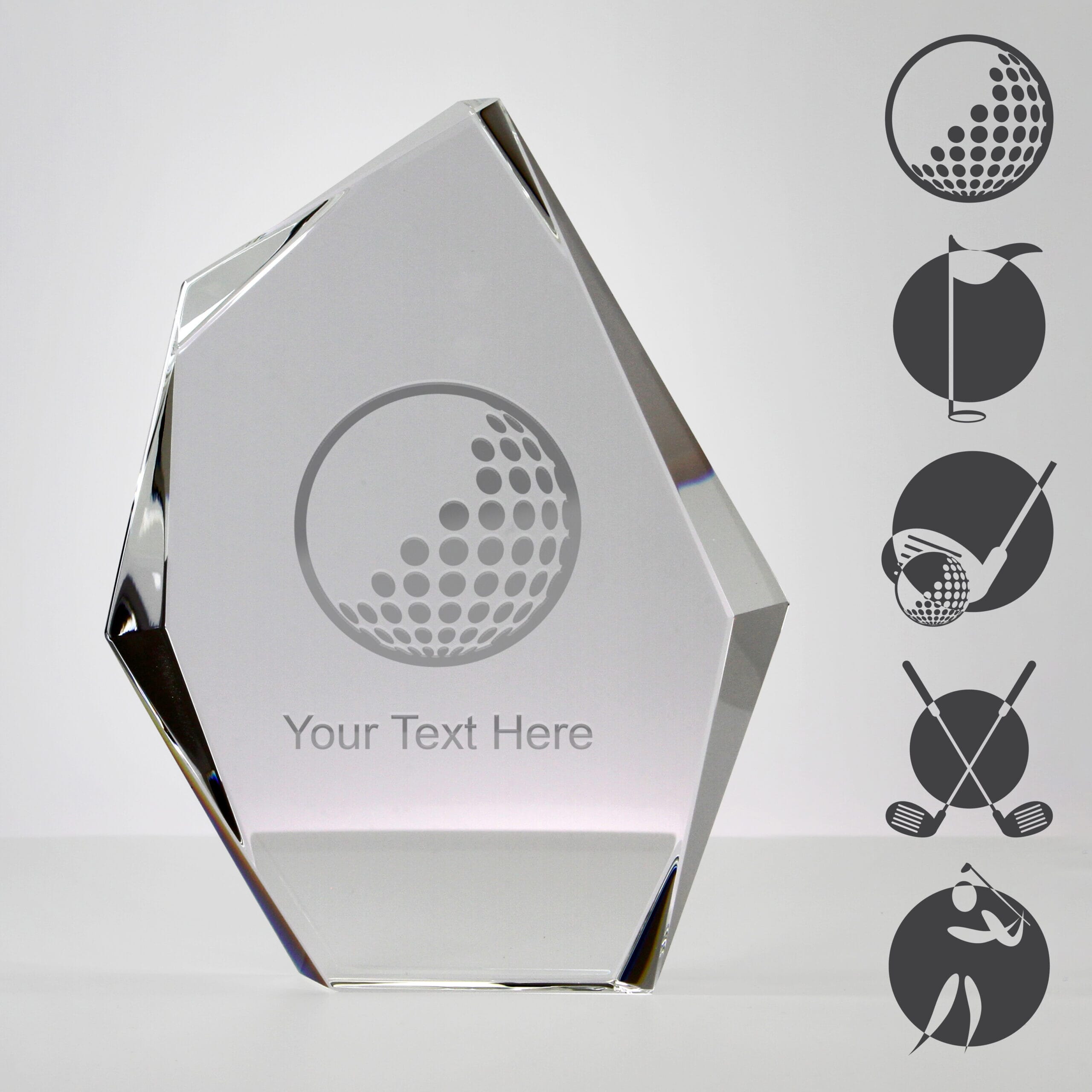 ice peak golf trophy with examples of golf-themed artwork engraved on the surface