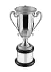ornate vintage golf trophy cup with three handles, mounted on a black stained wooden base