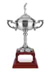 Nickel-plated loving cup style golf trophy with long stem and short cup, complete with lid topped with golfer figurine. Mounted on a rosewood finish square base with an engraving plate