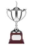 Silver nickel-plated golf trophy with ornate handles, mounted on a square base with an unengraved name plate. Complete with lid topped with a figurine of a golfer.