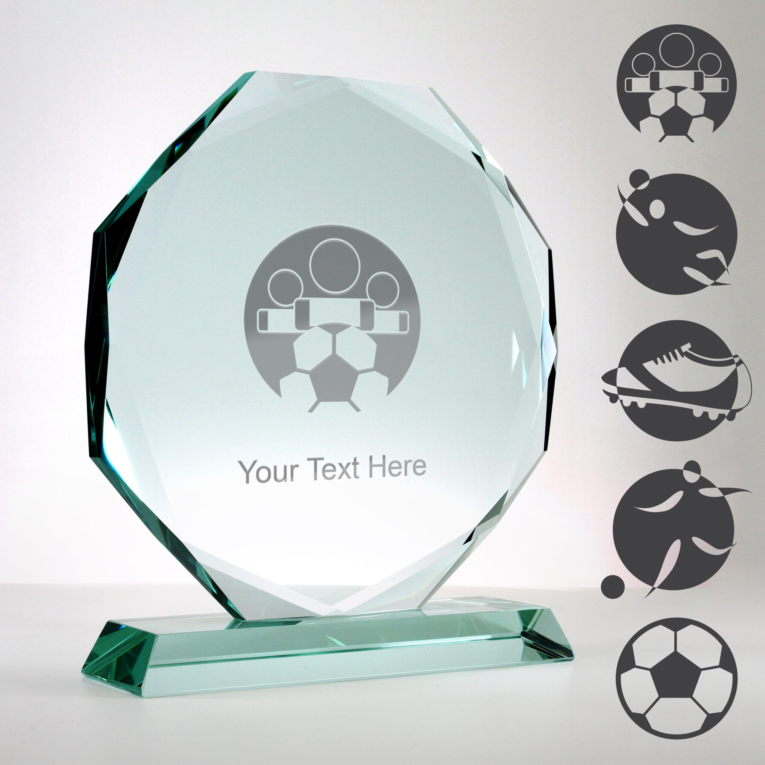 facetted glass football trophy with examples of football engraving