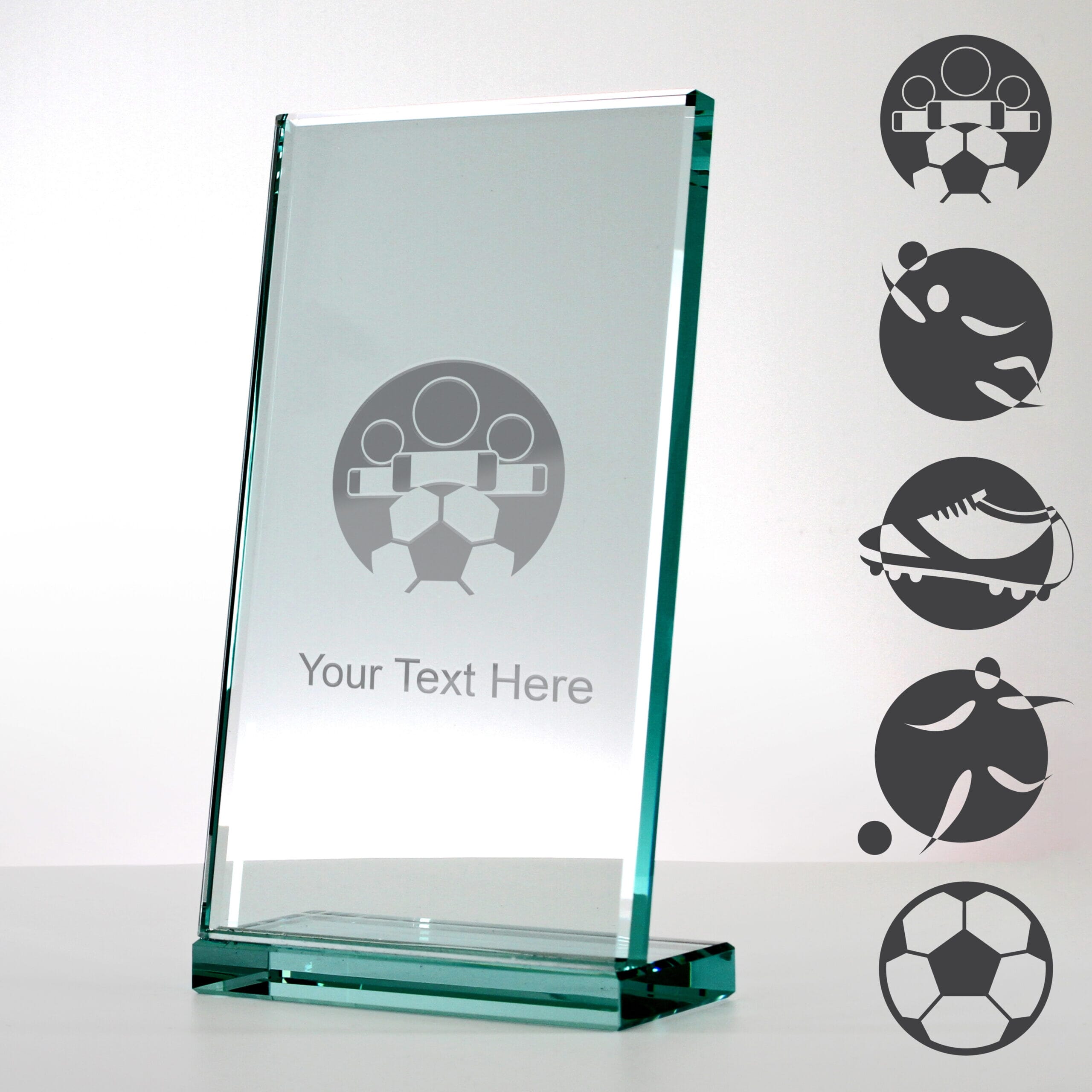 modern angled glass trophy with examples of football engraving