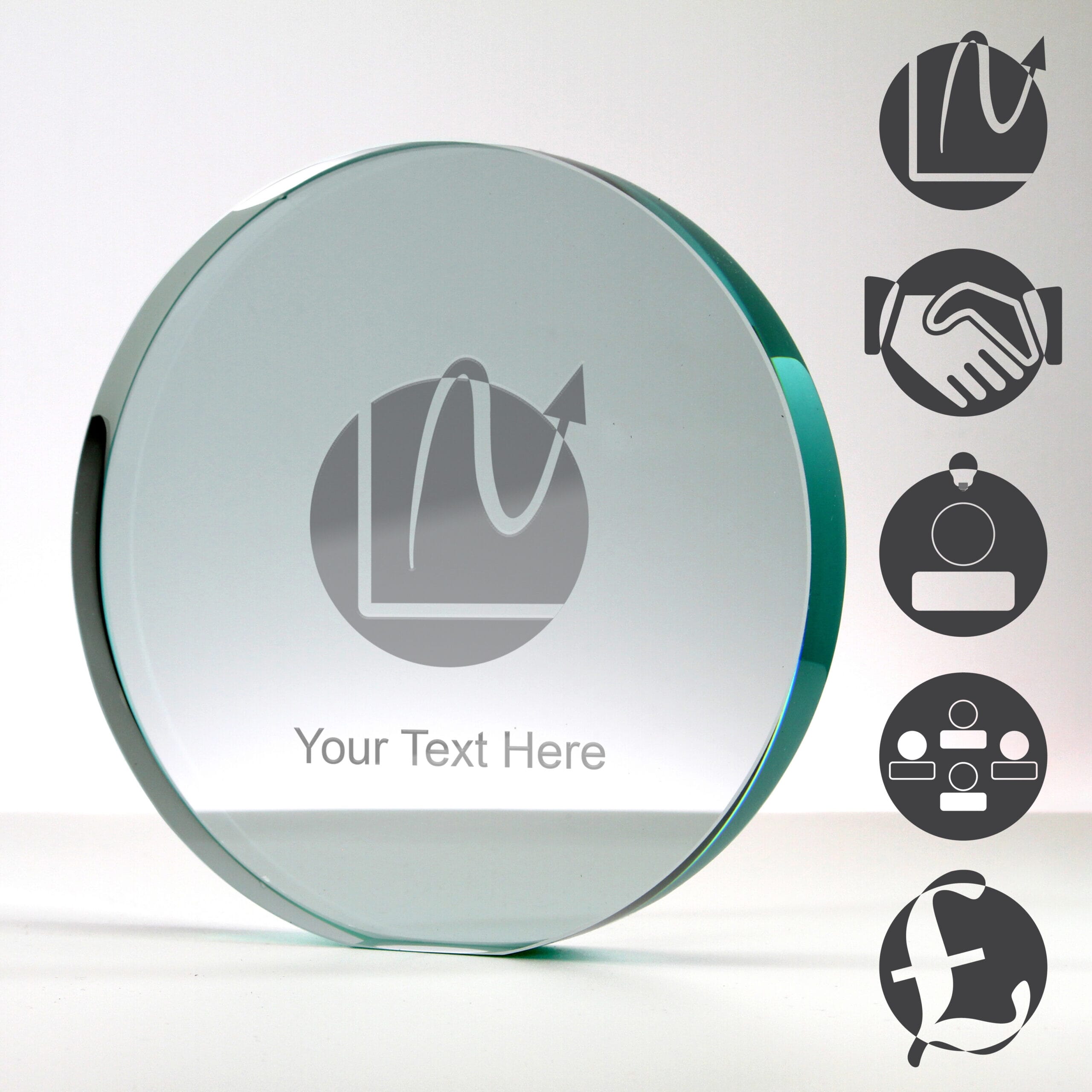 round crystal corporate trophy with five examples of corporate themed engraving
