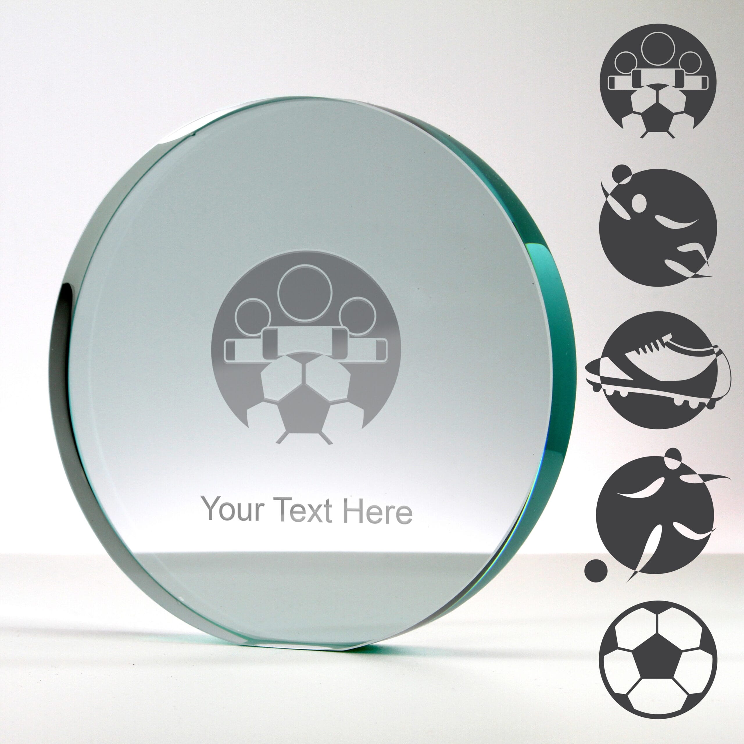 round crystal football trophy with examples of football engraving