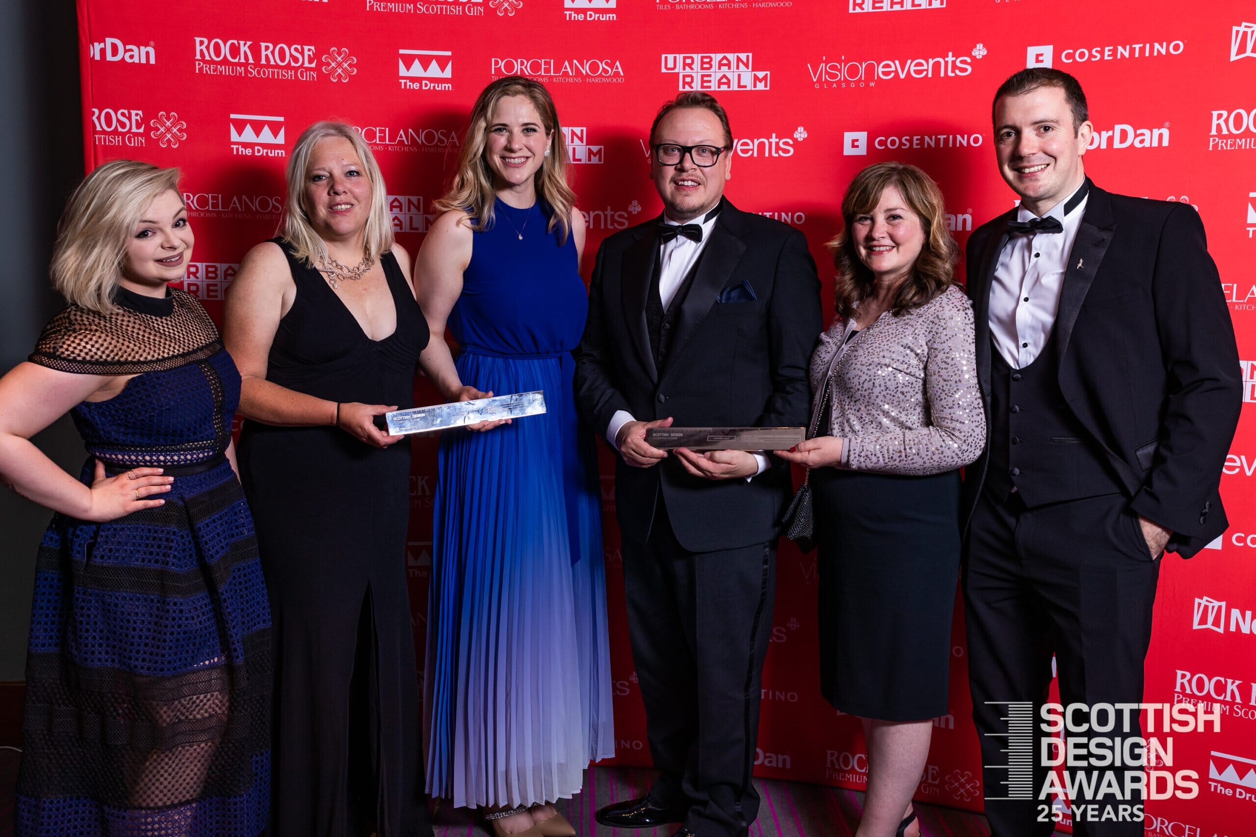 SDA22-BackdropWinnersMingling-LowResLogo-9-scaled-1