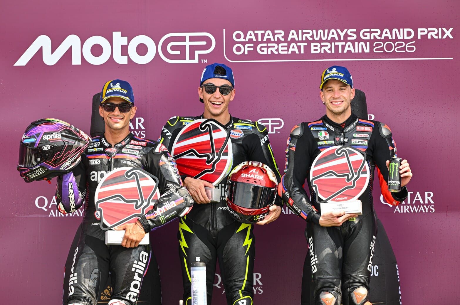 Group-Photo-Winners-with-Custom-Trophies-MotoGP